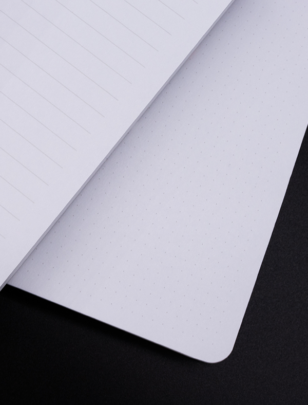 black background with white inner notebook pages showing lined and dot grid