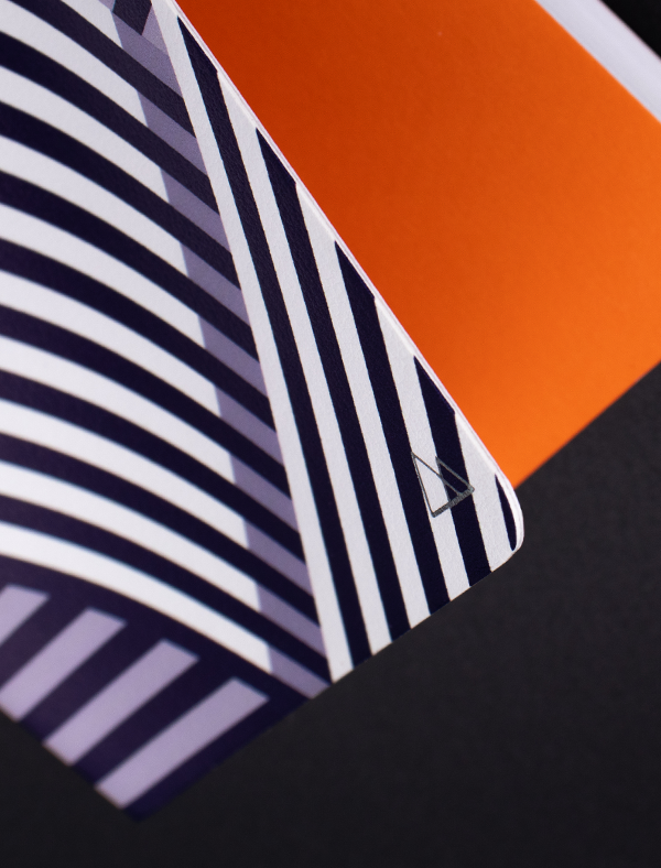 The Striped Cargo Hills notebook showing the bright orange inner page cover 